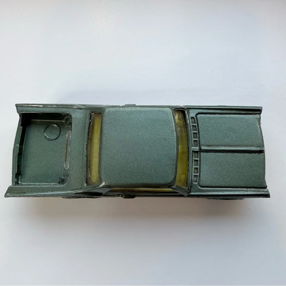 Vintage Husky Oldsmobile Starfire Coupe die-cast toy car rare green